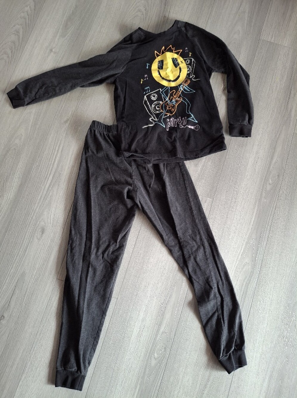 Kids Black Pajama Set with Yellow Smiley Graphic